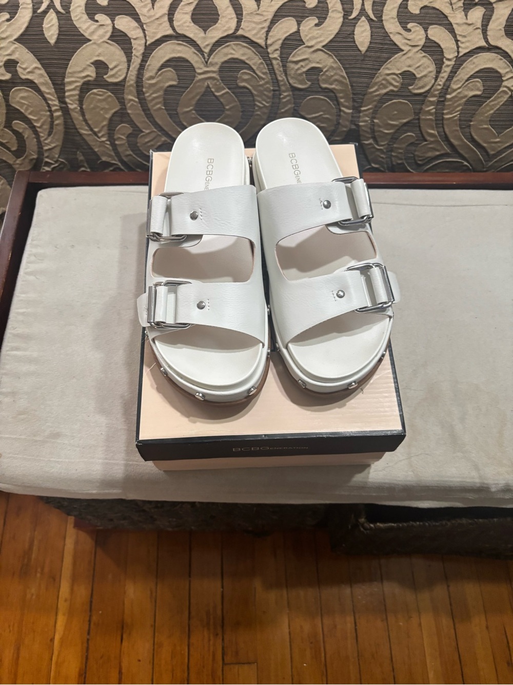 BCBGeneration Bamba White Double-Buckle Slide Sandals with Silver Buckles